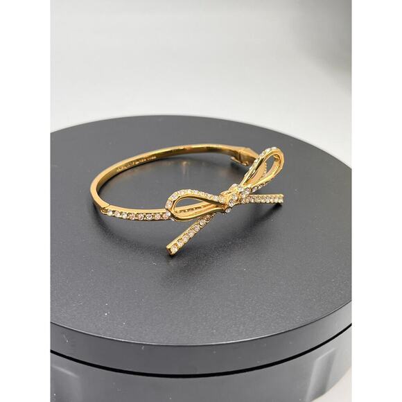 Kate Spade NY Skinny Mini Pave Bow
Gold Plated Hinged Bangle Feminine Bracelet - Picture 2 of 9